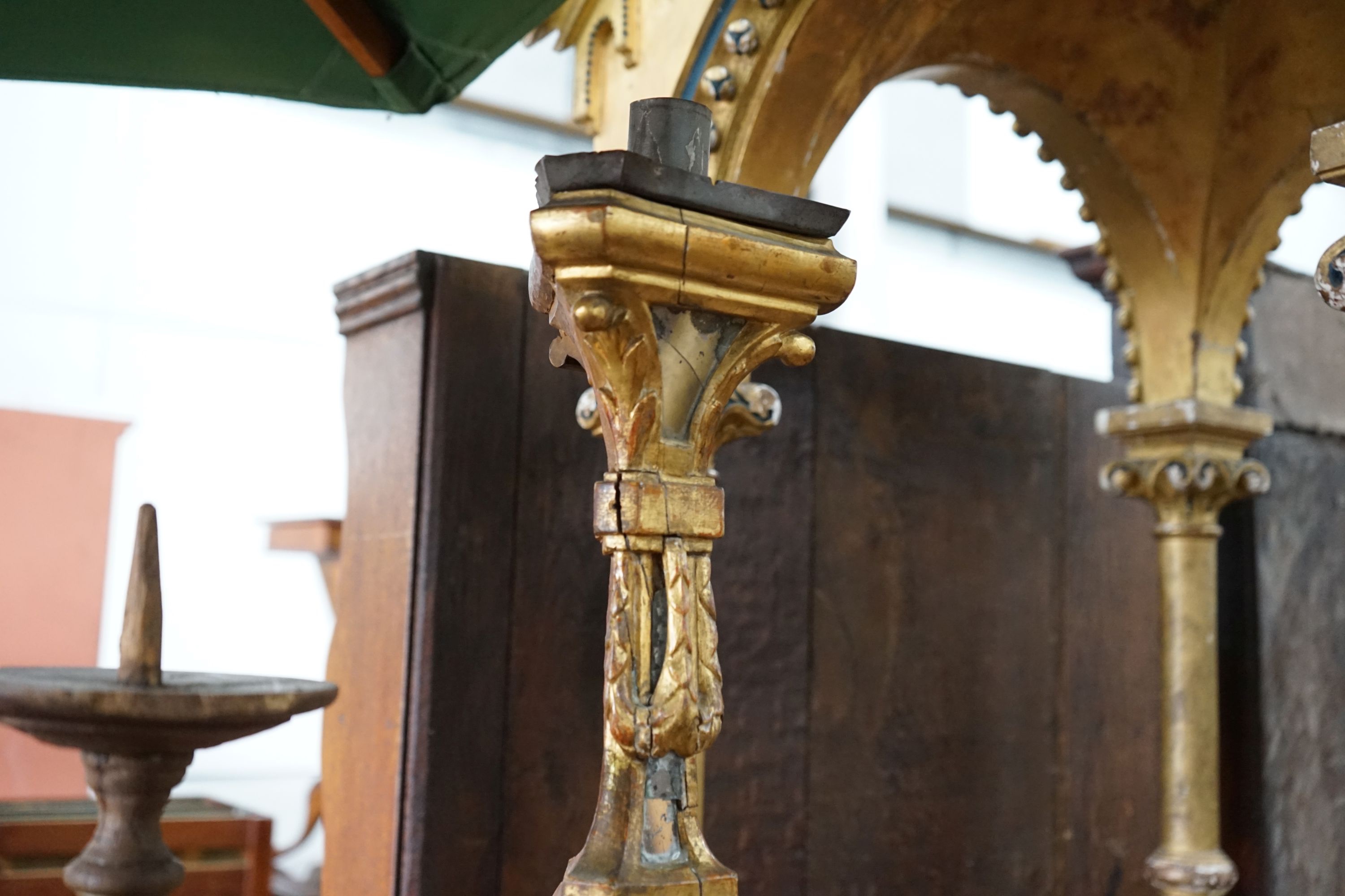 Two 18th century style Italian giltwood altar sticks, larger height 82cm